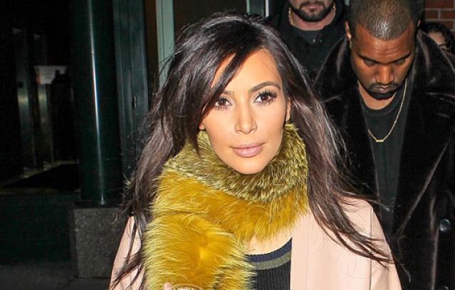 Kim Kardashian on bizarre furry scarf with Kanye West