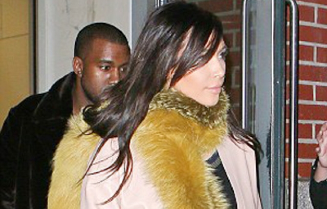 Kim Kardashian on bizarre furry scarf with Kanye West