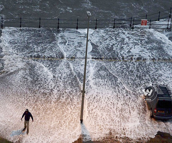 Sea walls breached in Britain