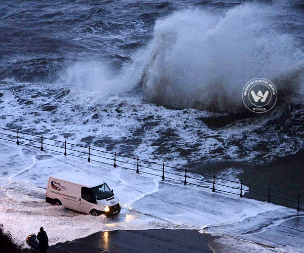 Sea walls breached in Britain