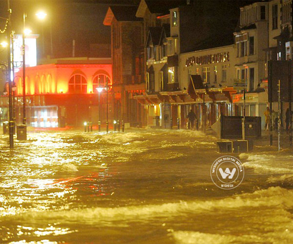 Sea walls breached in Britain