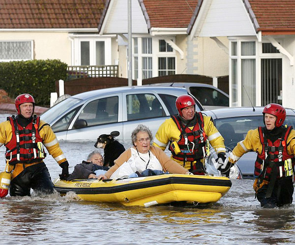 Sea walls breached in Britain