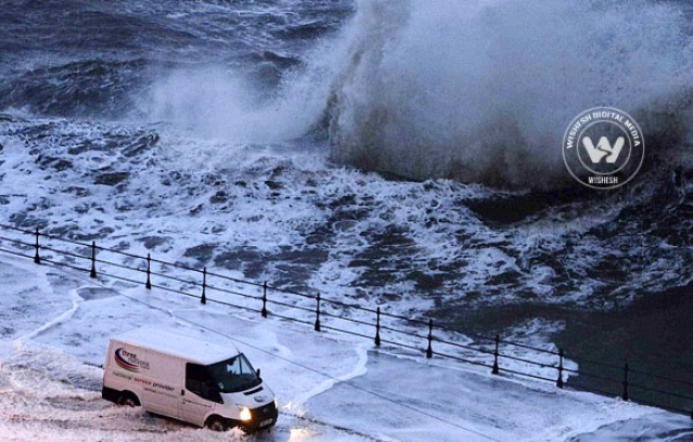 Sea walls breached in Britain