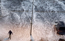 Sea walls breached in Britain