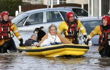 Sea walls breached in Britain