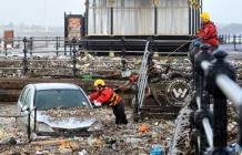 Sea walls breached in Britain