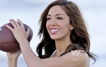 Farrah Abraham plays ball on golden sands