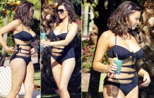 Jessica Wright into an unusual tie-up swimsuit