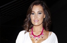 Jessica Wright into an unusual tie-up swimsuit