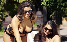 Jessica Wright into an unusual tie-up swimsuit