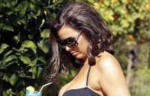 Jessica Wright into an unusual tie-up swimsuit