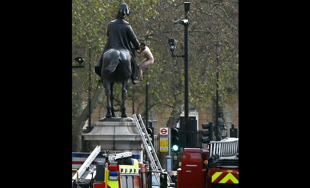 Man in naked standoff on London statue