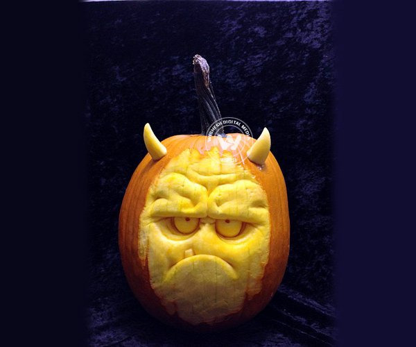 Carving a pumpkin at Halloween