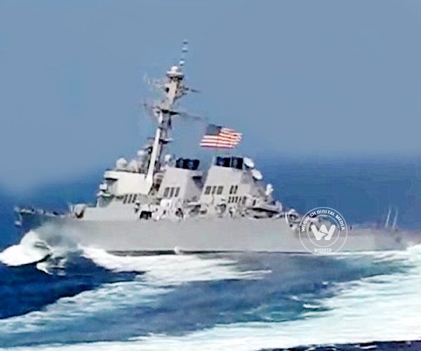 Sailors hang on