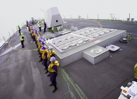 Sailors hang on