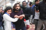 Jamia Millia Islamia (JMI), protest, gunman opens fire injures indian student in attack on citizenship protest, Jamia millia islamia