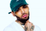 Chris Brown, Florida, r b singer chris brown arrested in florida moments after leaving stage, Chris brown