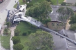 many homes affected by care collapse, many homes affected by care collapse, crane collapses on to several homes in florida, Crumbled
