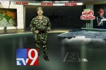 tv9 news channel, tv9 anchor wearing army uniform, tv9 anchor reporting fallout of terror attack wearing army fatigues holding toy gun goes viral, Circus