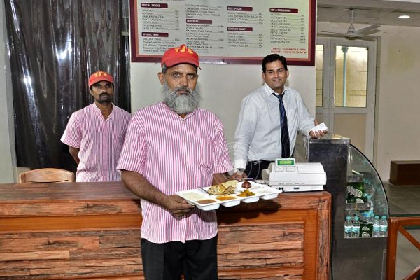 Tihar Jail serving delicacies at restaurant },{Tihar Jail serving delicacies at restaurant